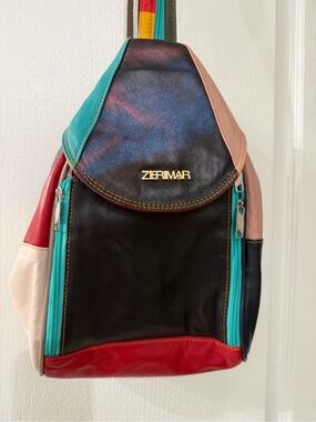 Zerimar patchwork leather sling backpack